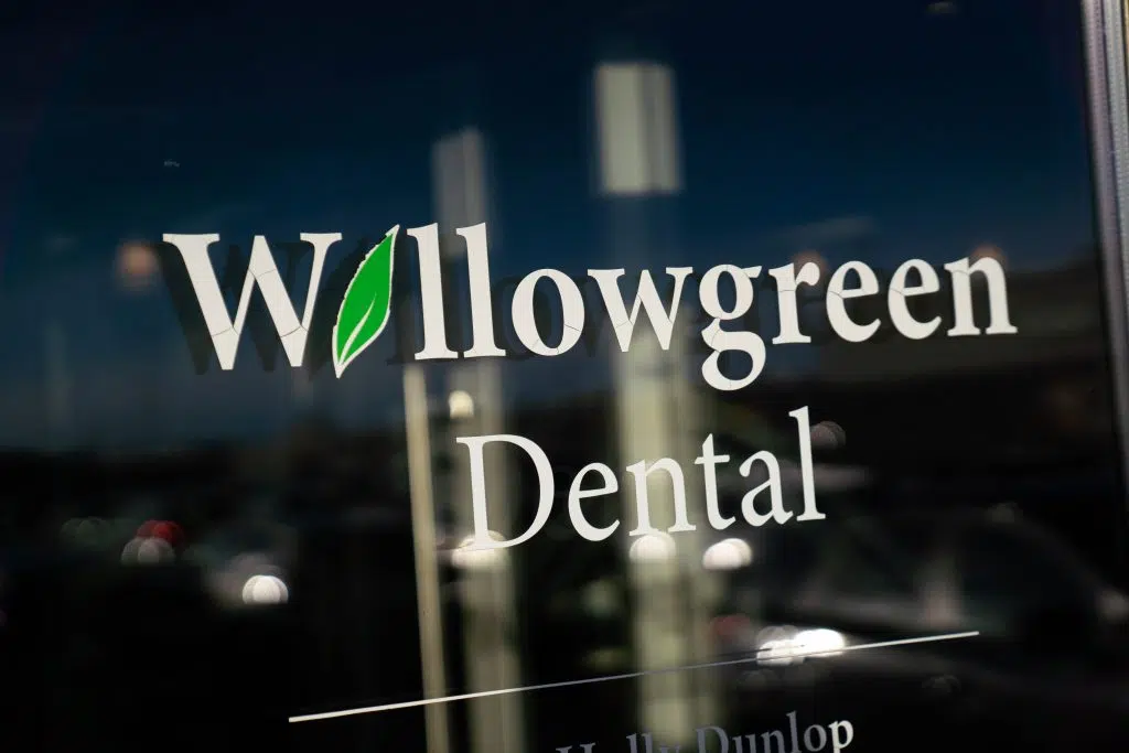 willowgreen dental logo on the glass
